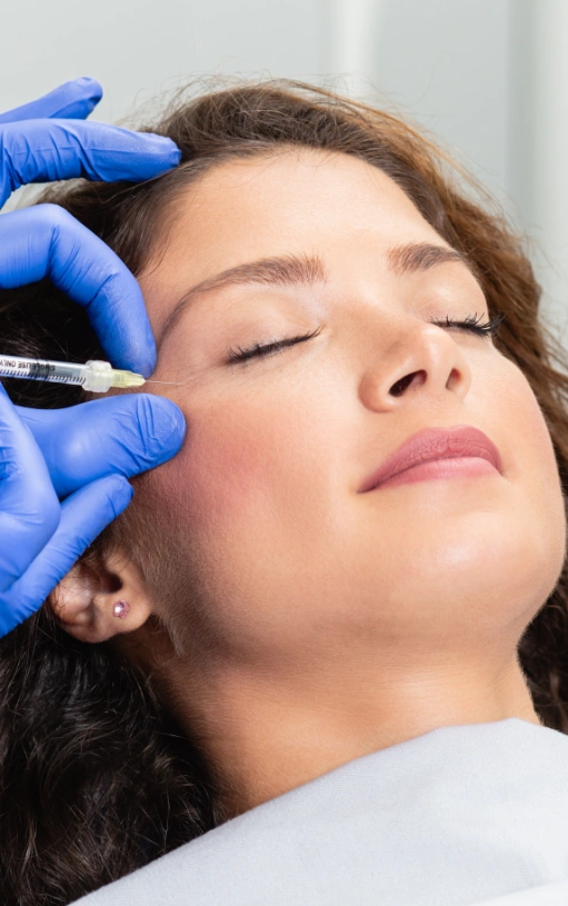 young woman getting botox injections