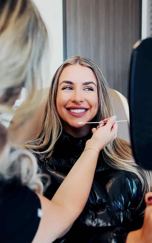 beautiful woman receiving treatment for face