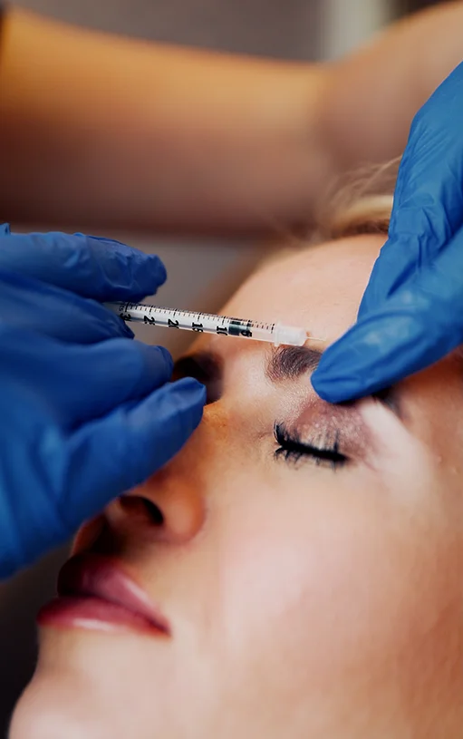 woman receiving neurotoxin injection