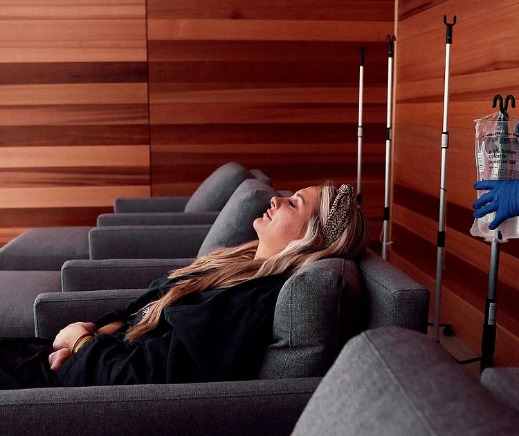 Woman enjoying salt room therapy at myEvergreen MedSpa