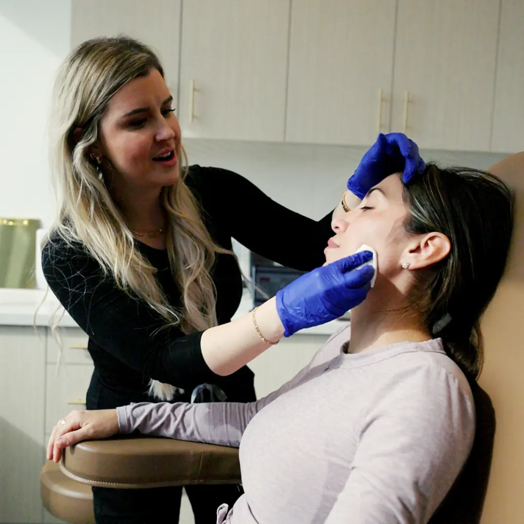 Megan treating a client with BOTOX